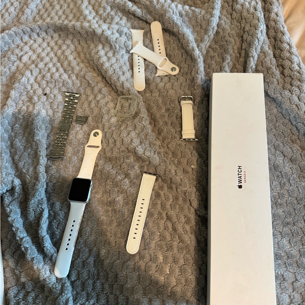 White Smartwatch with Interchangeable Bands read bio